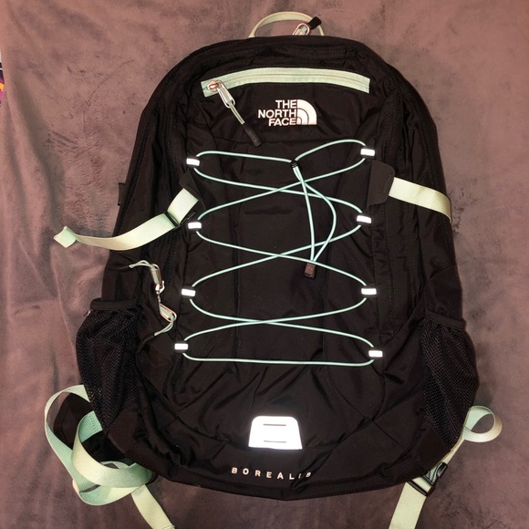 north face backpack black and green